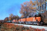 B&LE, Bessemer and Lake Erie SD38AC 869- SD18 854- SD-M 858 ex-DM&IR 191>319- SD38-2 878, is northbound with a loaded coal train at Meadville, JCT. Pennsylvania. October 21, 1999. 